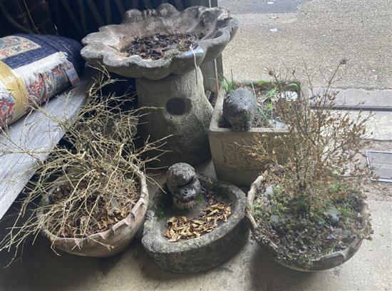 A reconstituted stone shell bird bath, one other, three planters and a hedgehog, tallest 52cm